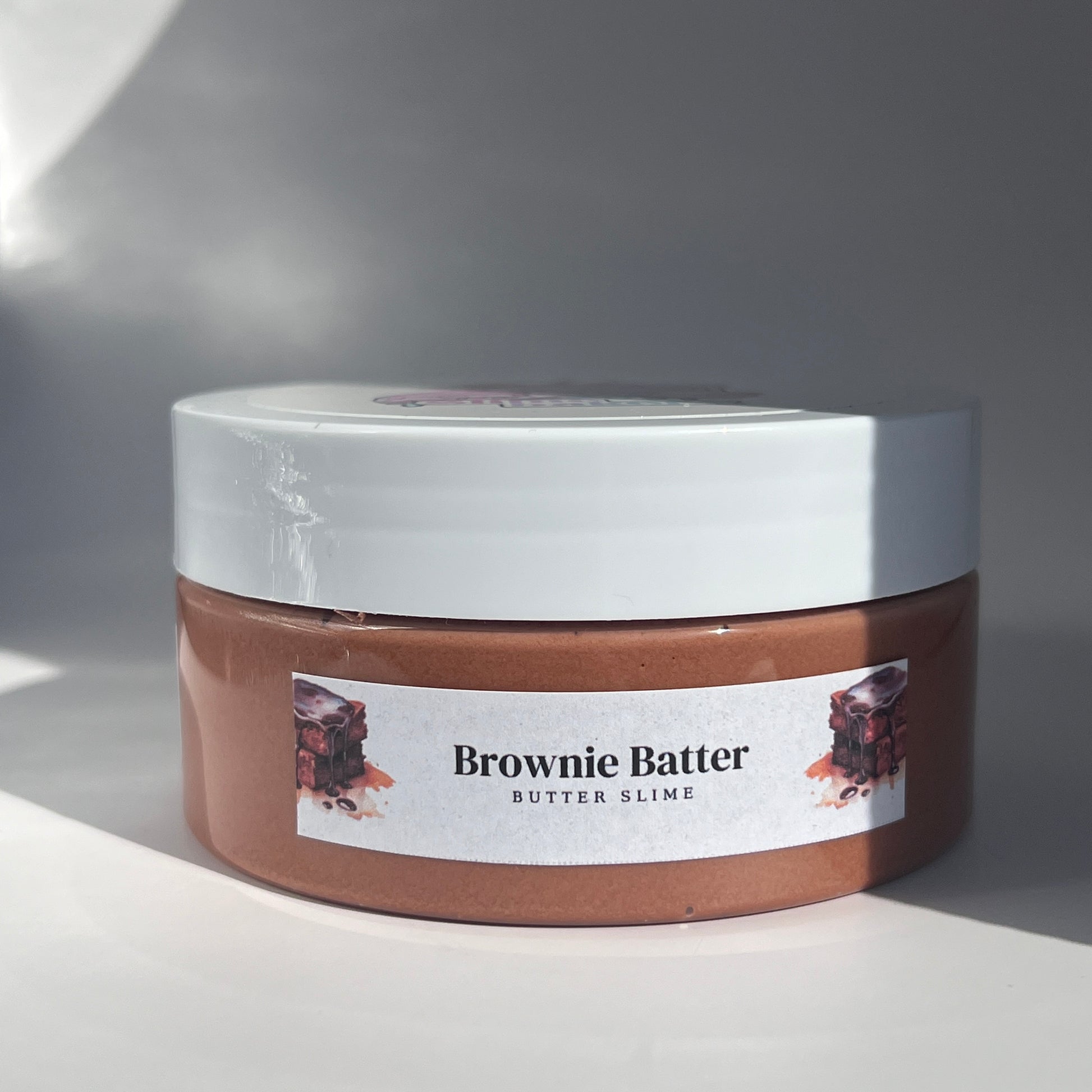 Brownie Batter Slime - Smooth chocolate brown butter slime with a creamy texture and delicious chocolate brownie scent for a satisfying sensory experience.