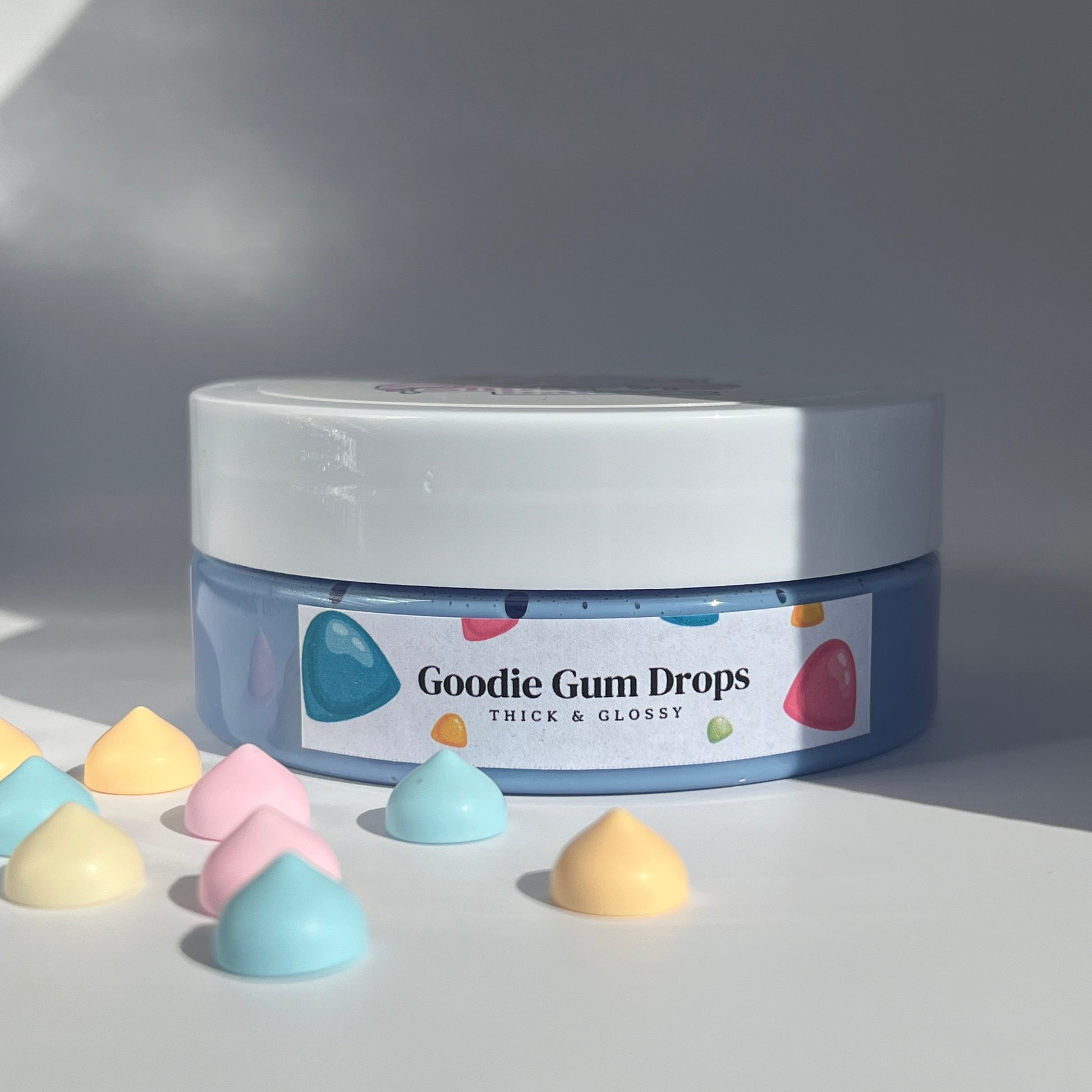 weet candy-scented butter slime in bluey-purple with colourful acrylic charms. Perfect gift for kids aged 8-14, providing engaging sensory play and relaxation.
