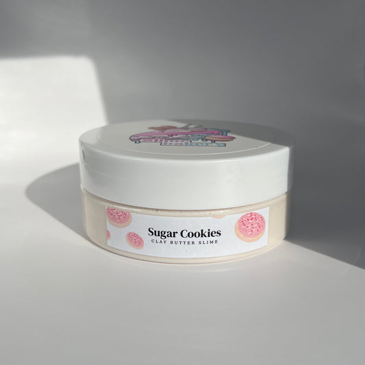 Sugar Cookies Slime - Cream-coloured cookie dough butter slime with sugar cookie charms and polymer sprinkles, perfect for gifts for children and teens. Offers a smooth, creamy texture and sweet sugar cookie scent.